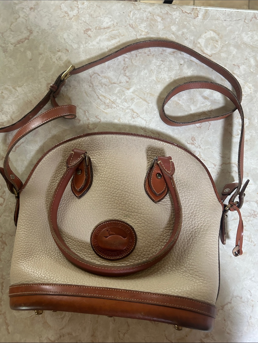 Dooney & Bourke Cream Pebbled Leather Crossbody with Brown Trim